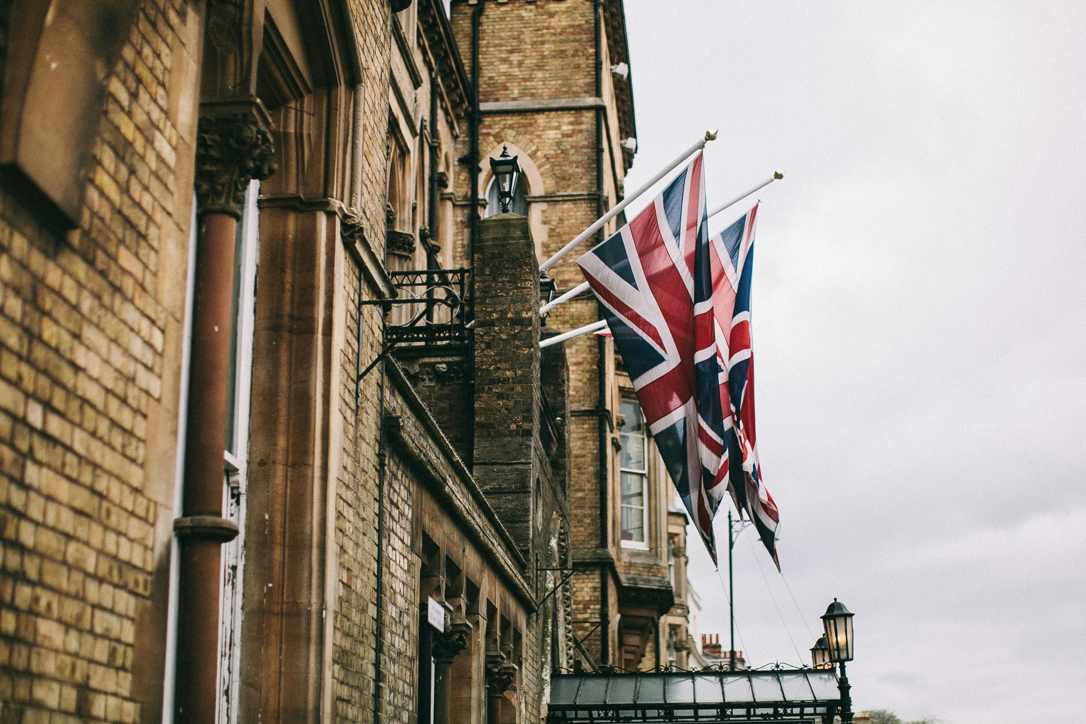 Hanged British Flags Beside Building