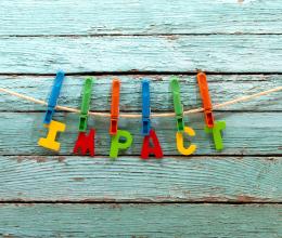 letters spelling out 'impact'