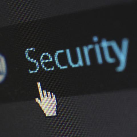 Digital screen showing the word 'security' and the pointer hovering over it