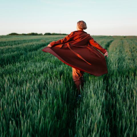 Lady walking in field