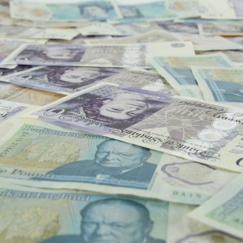 British pounds bank notes spread out on a surface