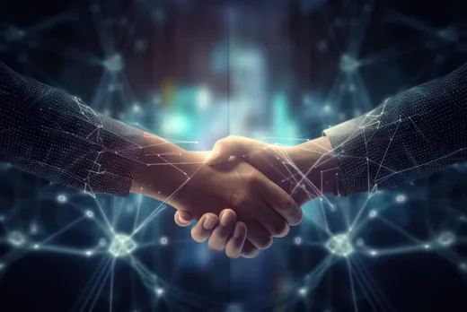two white hands shaking hands with a blurry background and graphics around them which show lines and dots connecting 