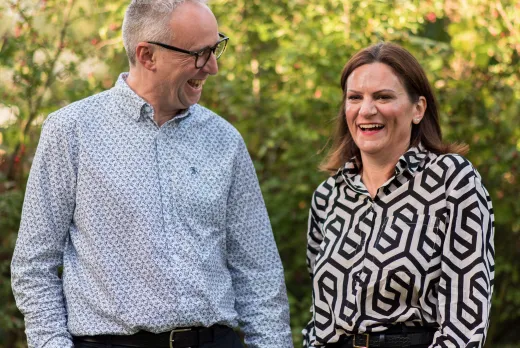 Andy and Hazel standing and smiling